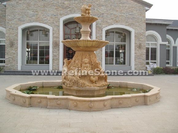 carved animal water fountain