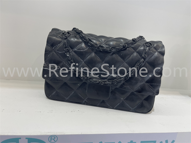 Black marble bag sculpture