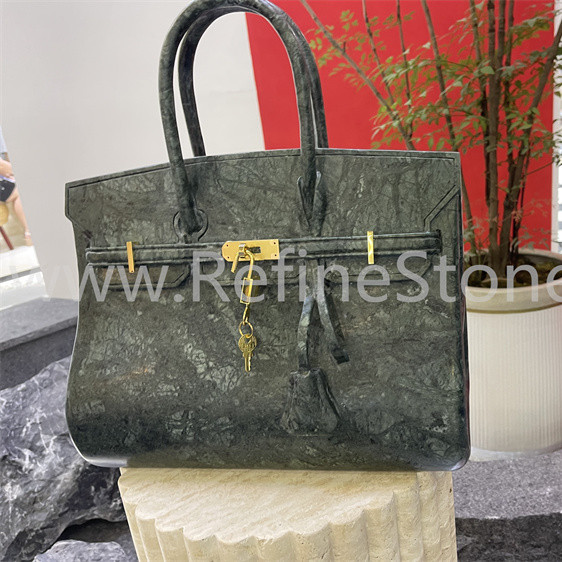 Green marble bag sculpture